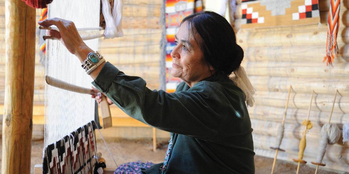 Woman weaving at Indian Market